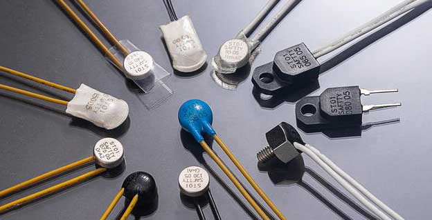 Button type thermal protector